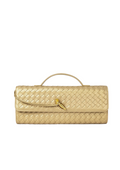 A woven leather clutch bag in a light gold or champagne color, featuring a top handle and a small gold clasp, shown against a plain white background.